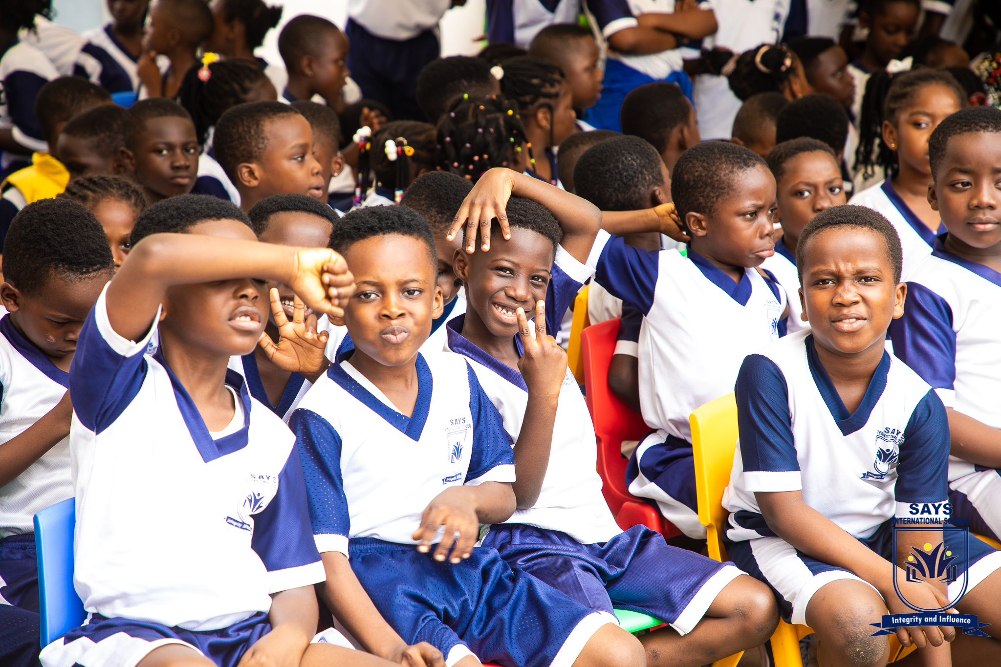 Grade one pupils gathered at school forecourt