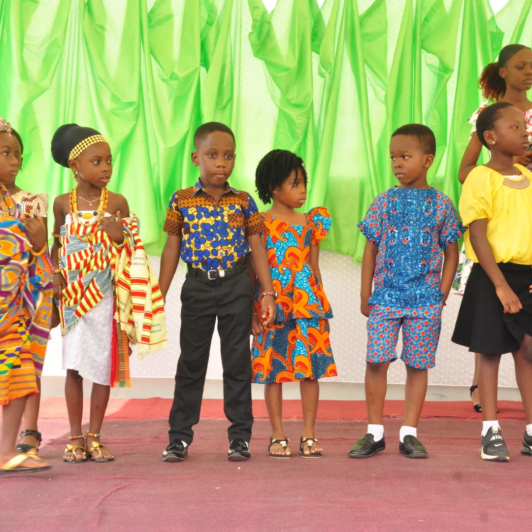 Pupils performing on stage