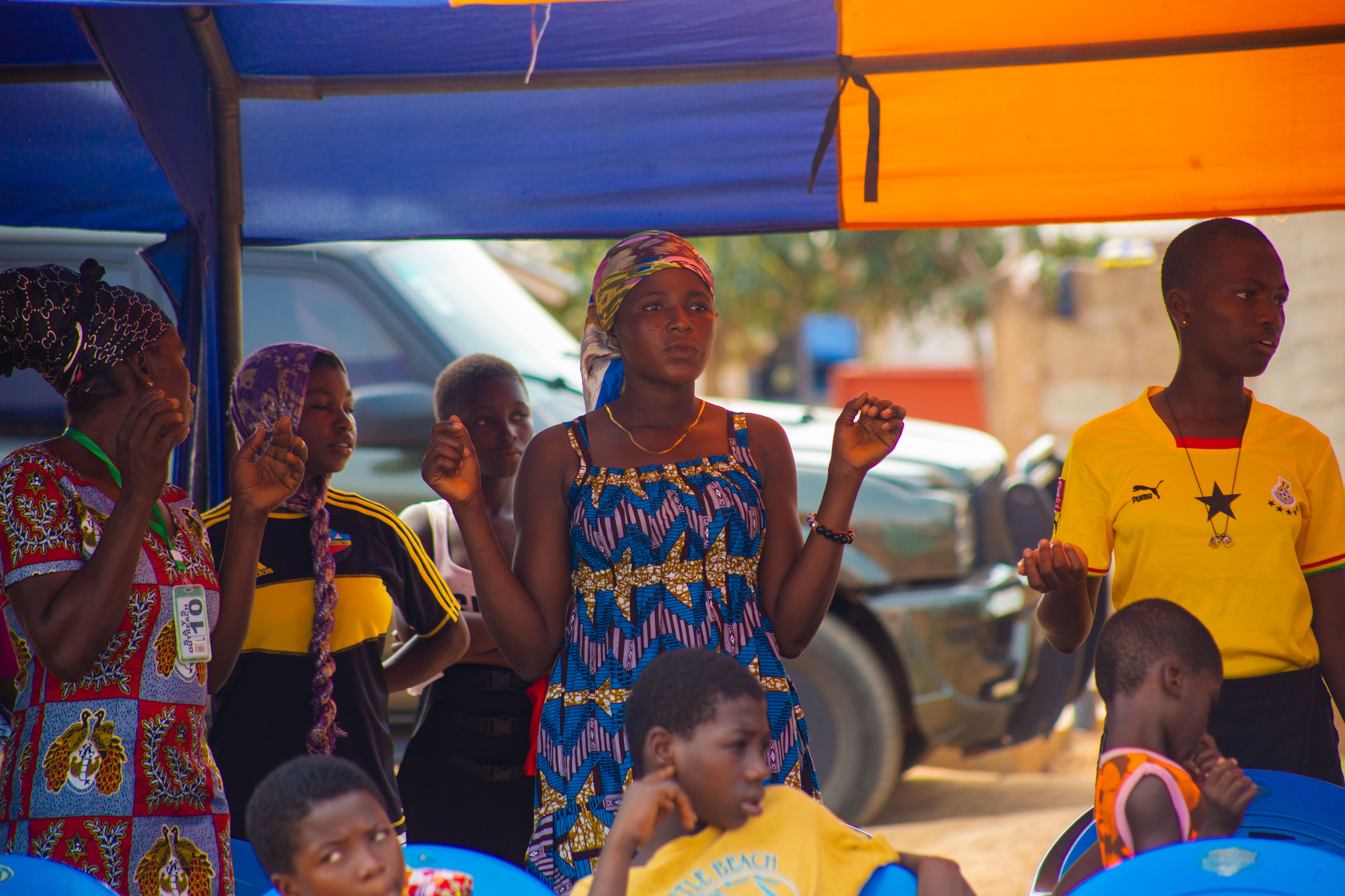 Children and volunteers sharing a moment