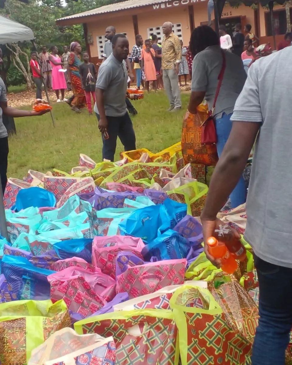 Facilitators arranging items for the communities