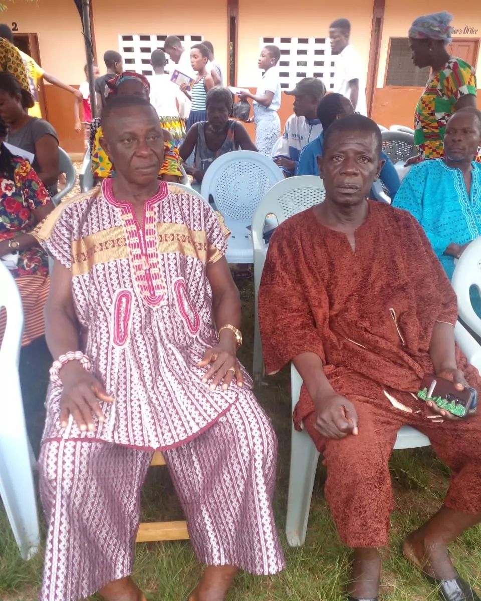 Elders of the community seated